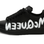 A. MQ –  GRAFFITI OVERSIZE BLACK
